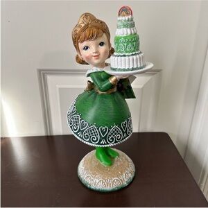 St Patrick’s Day Girl Holding A Rainbow Cake by Lucky Lane Decor